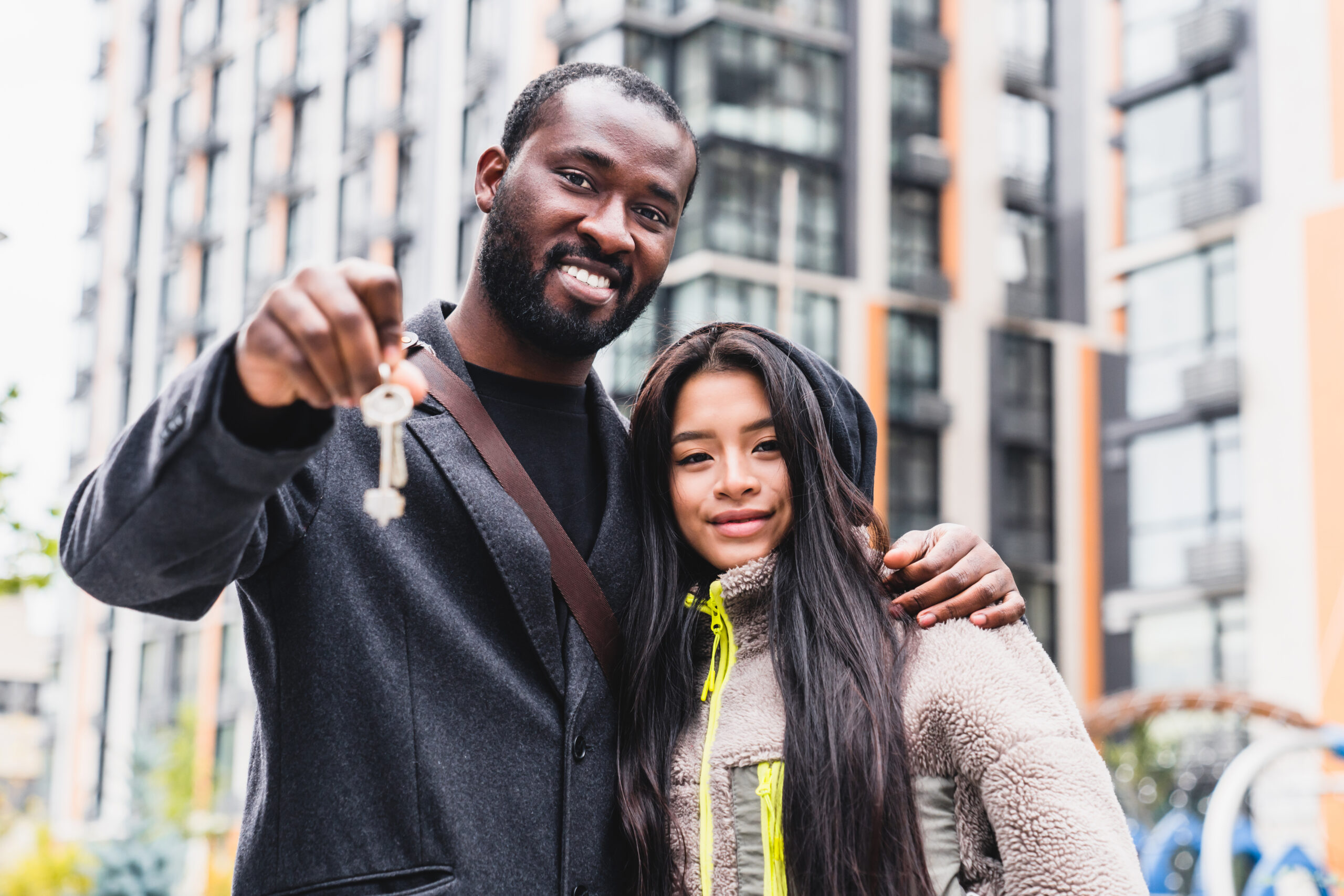 Property Management Services - Happy Couple Holding Keys