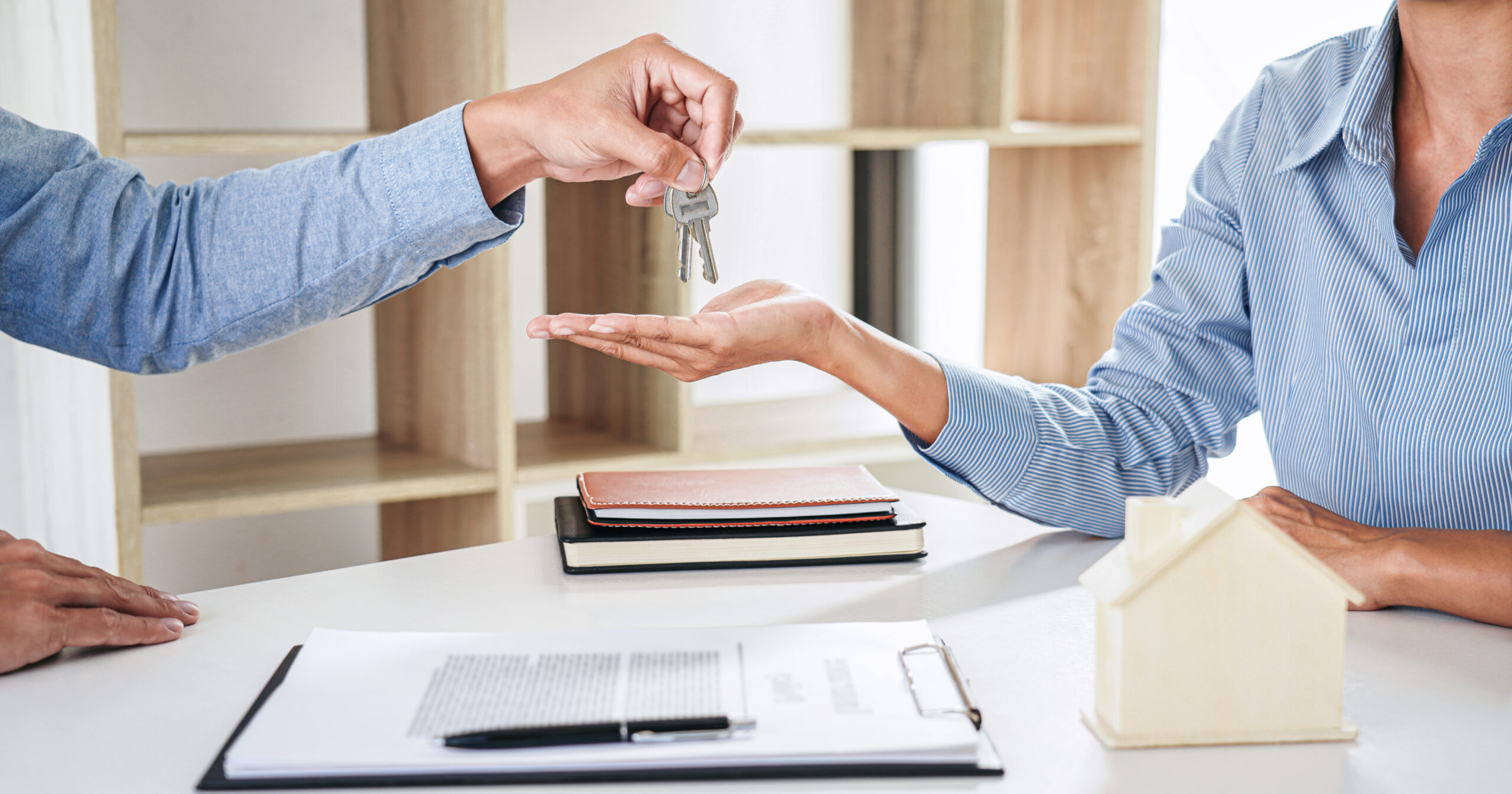 What Is Full Service Property Management - Estate Agent Giving Keys
